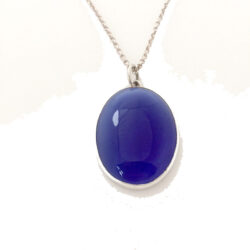 Silver pendant set with blue agate
